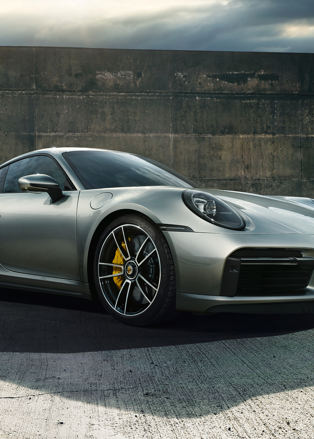 Sleek Silver Porsche 911 on Concrete: постер из коллекции Porsche