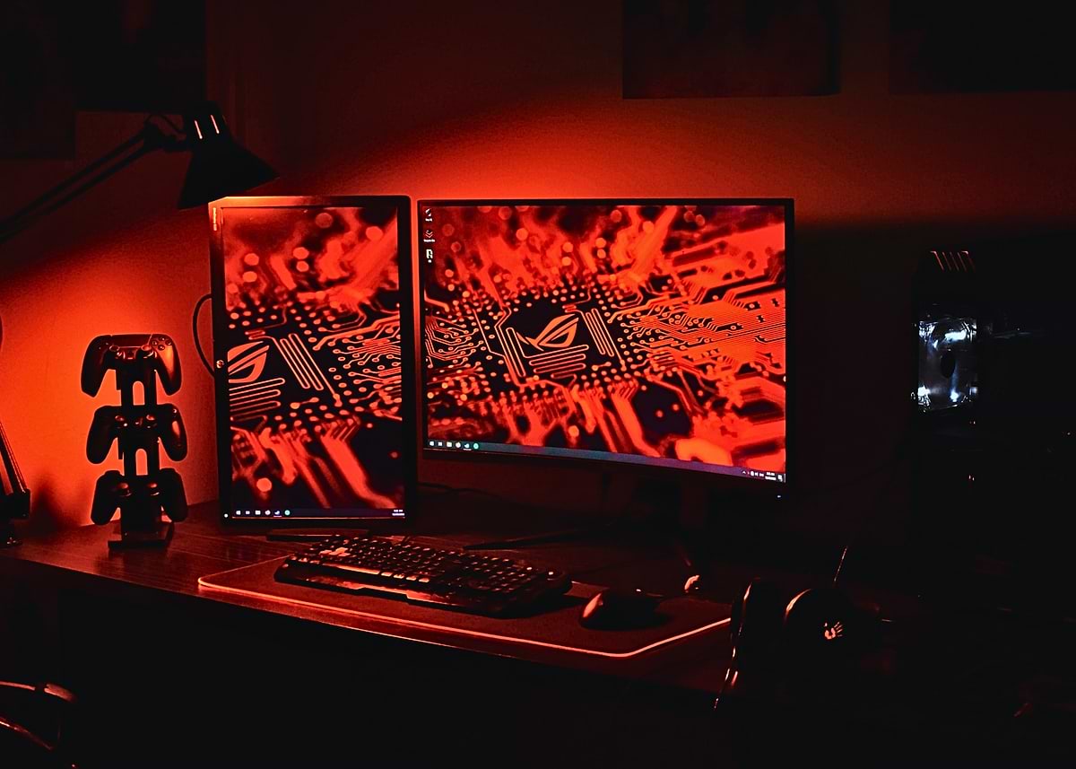 'Gaming Setup with Red Lighting' Poster, picture, metal print, paint by ...