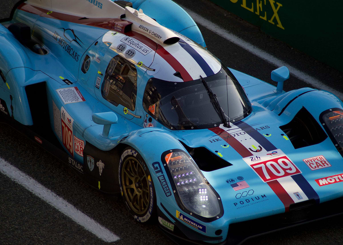'Light Blue Race Car Close-Up' Poster, picture, metal print, paint by ...