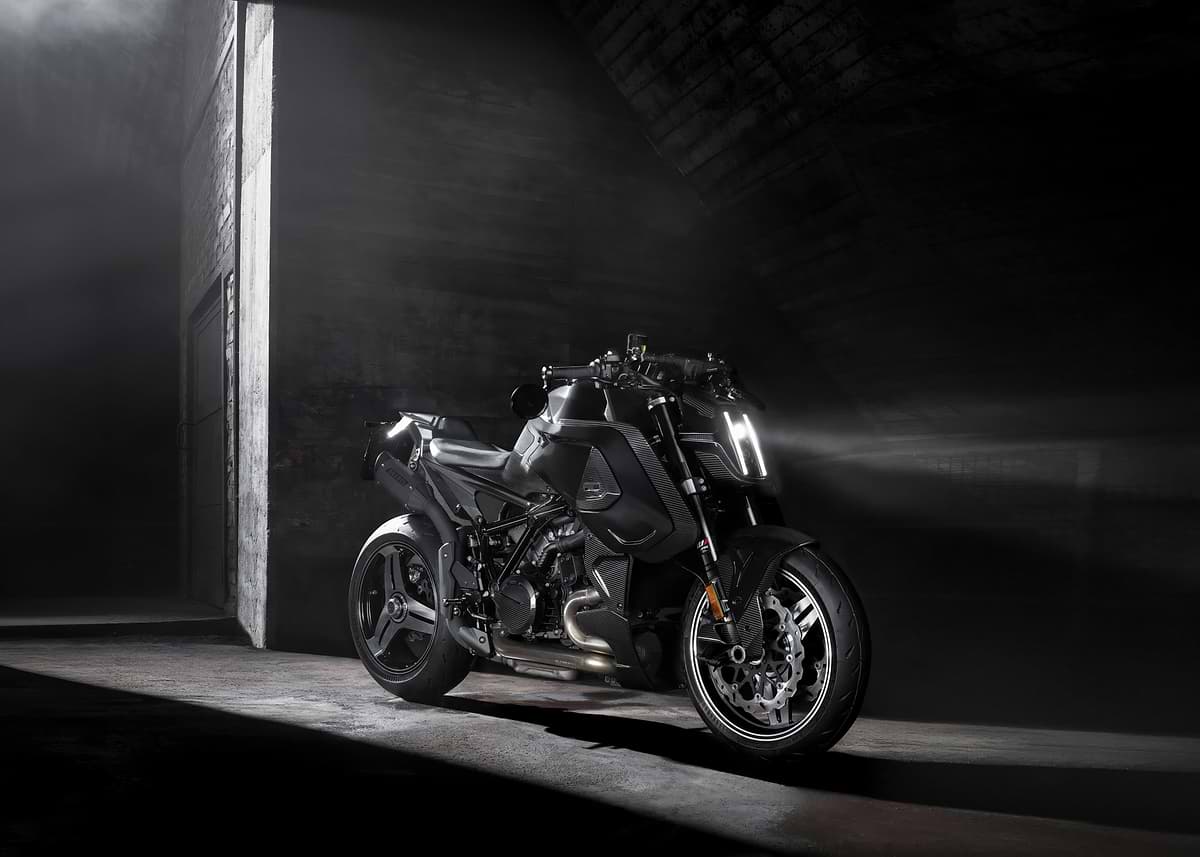 'Sleek Black Motorcycle in Dark Setting' Poster, picture, metal print ...