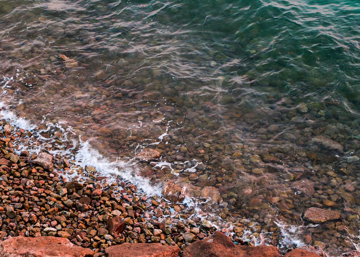 Pebble Beach Shoreline with Gentle Waves Poster, Picture & Metal Print ...