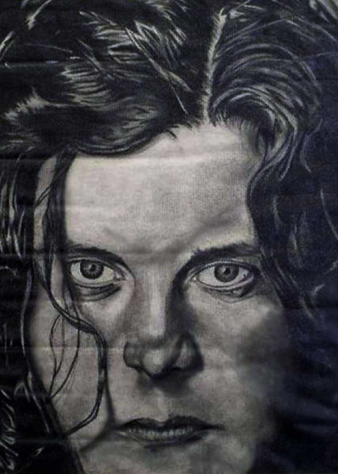 A portrait of a disturbed woman. Get lost in her stare! ...