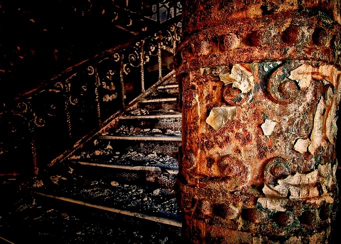 a Pillar from a stair Case in an Abandoned hospital Ins ...