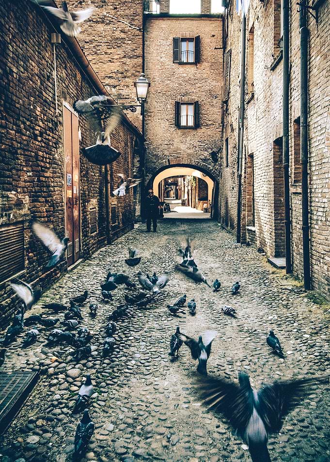 A morning in the ancient street of Ferrara, Italy.