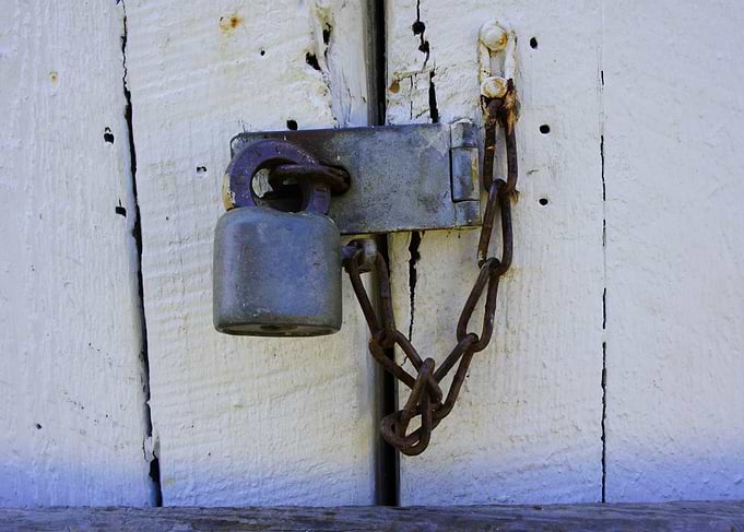 Close up of a rusty lock and chain