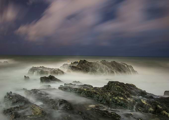 the water in motion with the blue sky