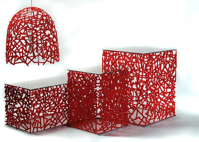 This is a table made from plastic spoons used in the co ...