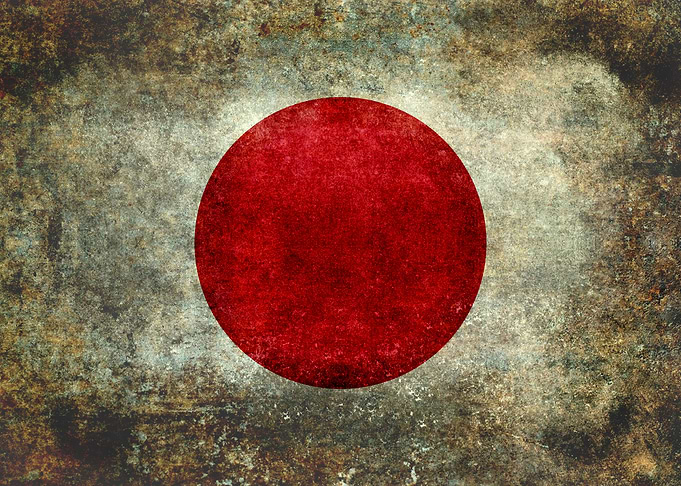 The national flag of Japan is a white rectangular flag ...