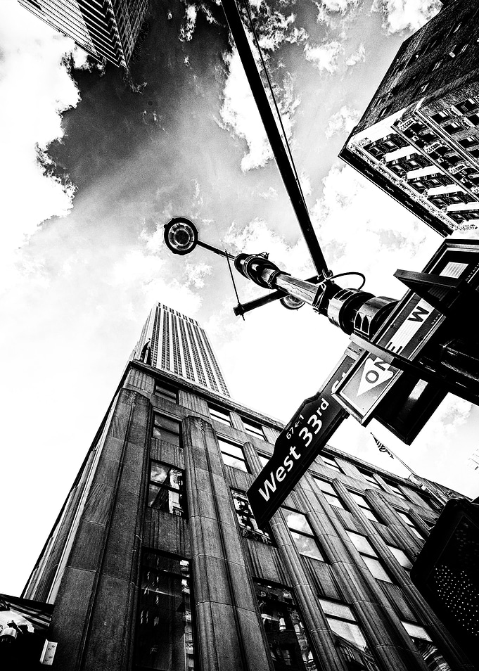 West 33rd street where the iconic Empire state building ...