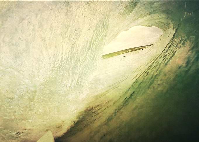 into the wave
