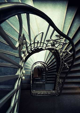Spiral staircase in green tones