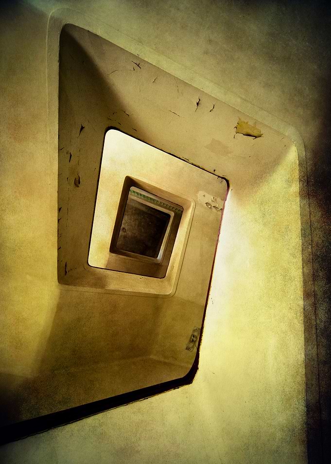 Forgotten staircase in old ruined hospital