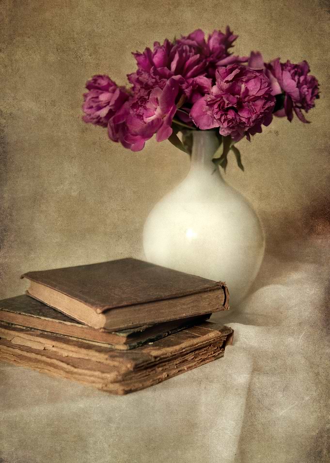 Still life with books and fresh peonies