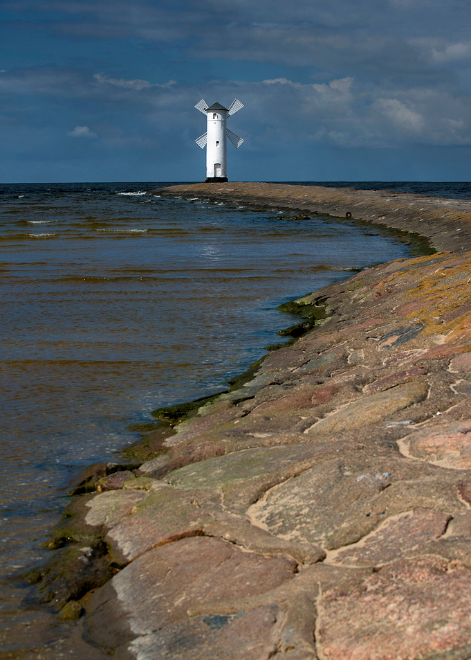 White Windmill by the sea