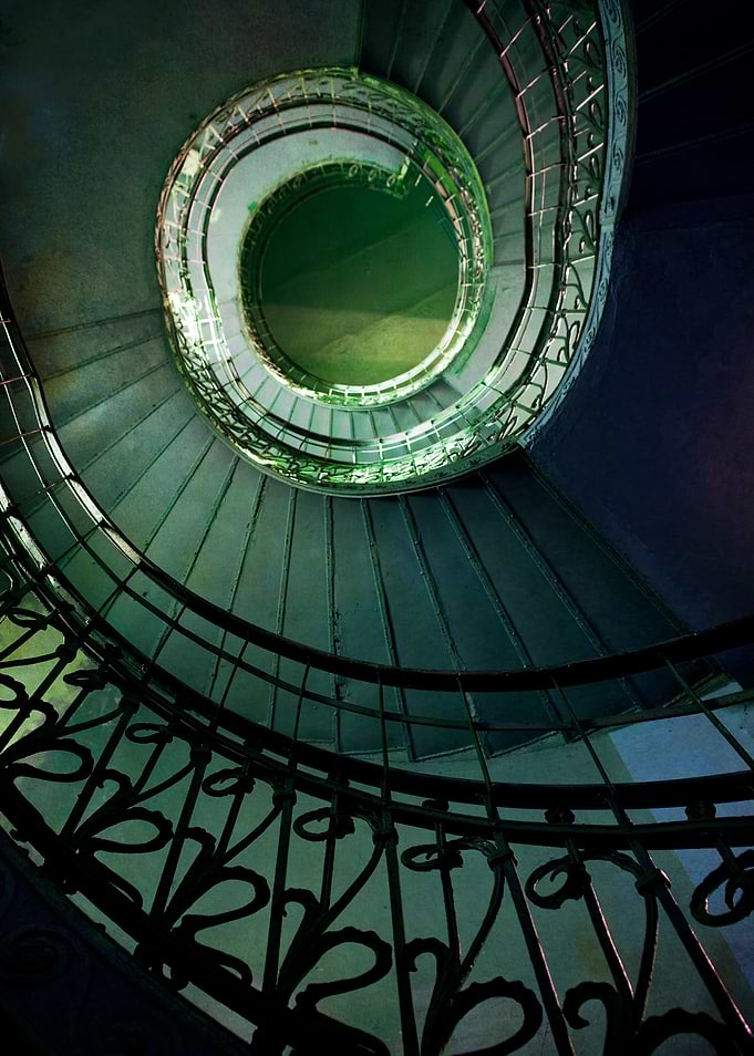 Spiral staircase in green tones
