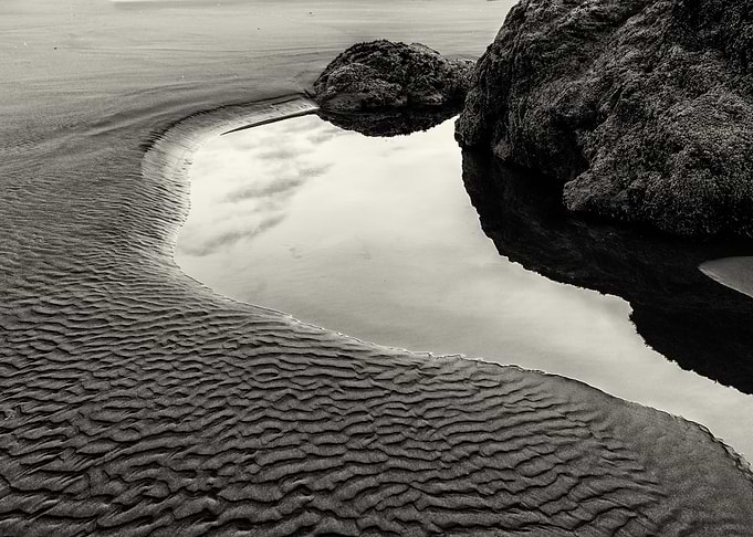 An extreme low tide on Brandon Beach Oregon can produce ...