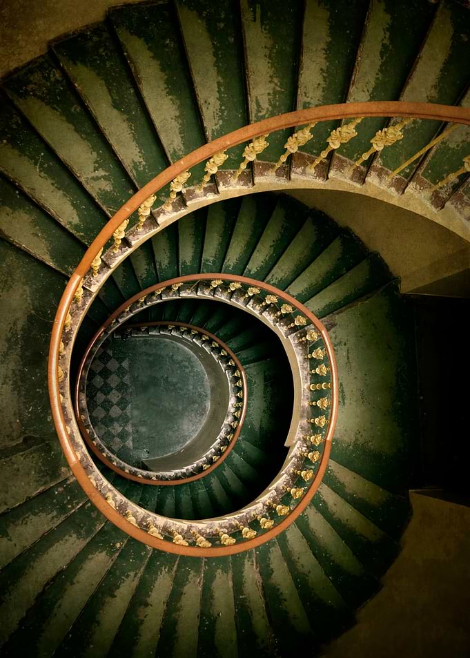 Old green spiral staircase