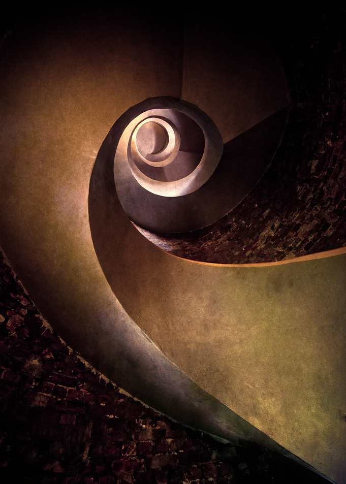 Spiral staircase in brown tones