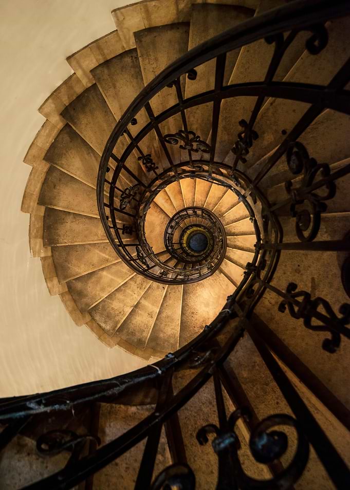 Spiral staircase in brown tones