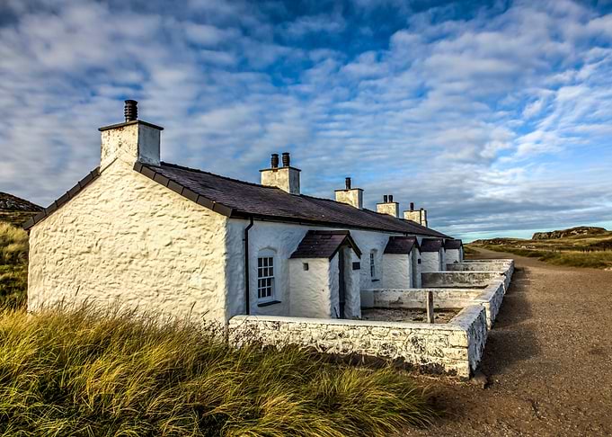 The row of four small cottages on Llanddwyn Island was ...