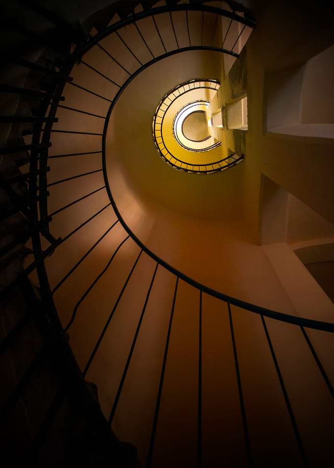 Modern spiral staircase in brown and yellow