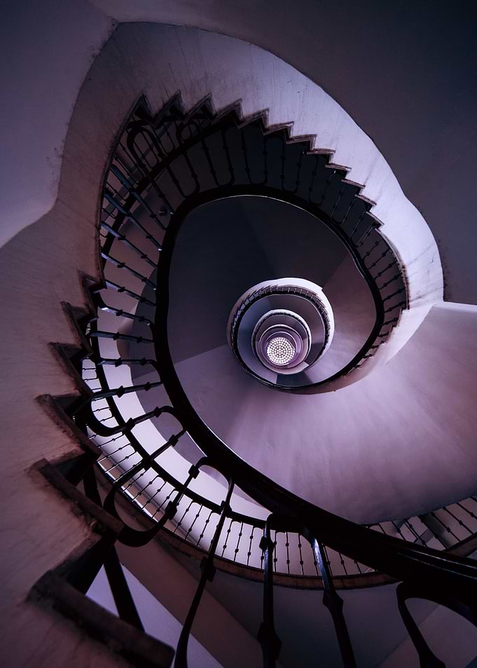 Spiral staircase in purple tones