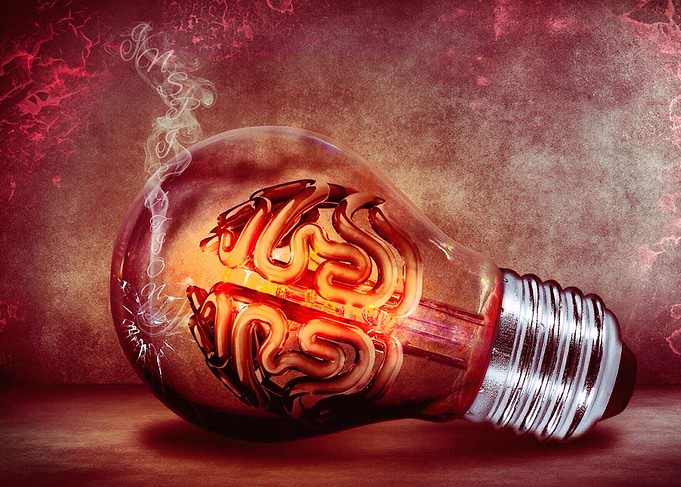 The lightbulb has smoke coming from it with the word In ...
