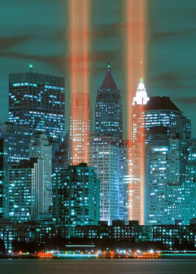 Graphic of the skyline of New York at night with lighti ...
