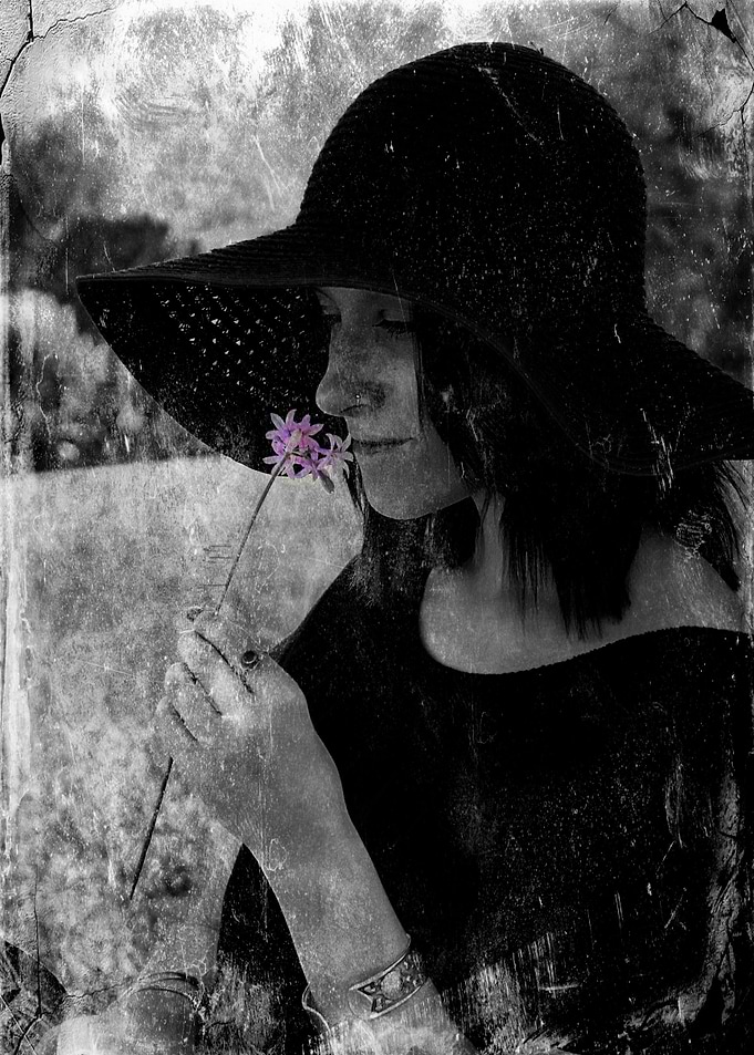 Vintage black and white portrait with just a dash of li ...