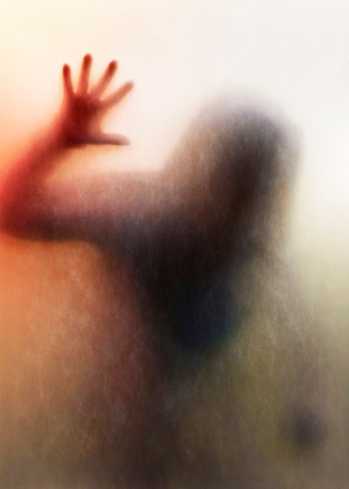 Silhouette of a woman in panic and bloody hand behind m ...