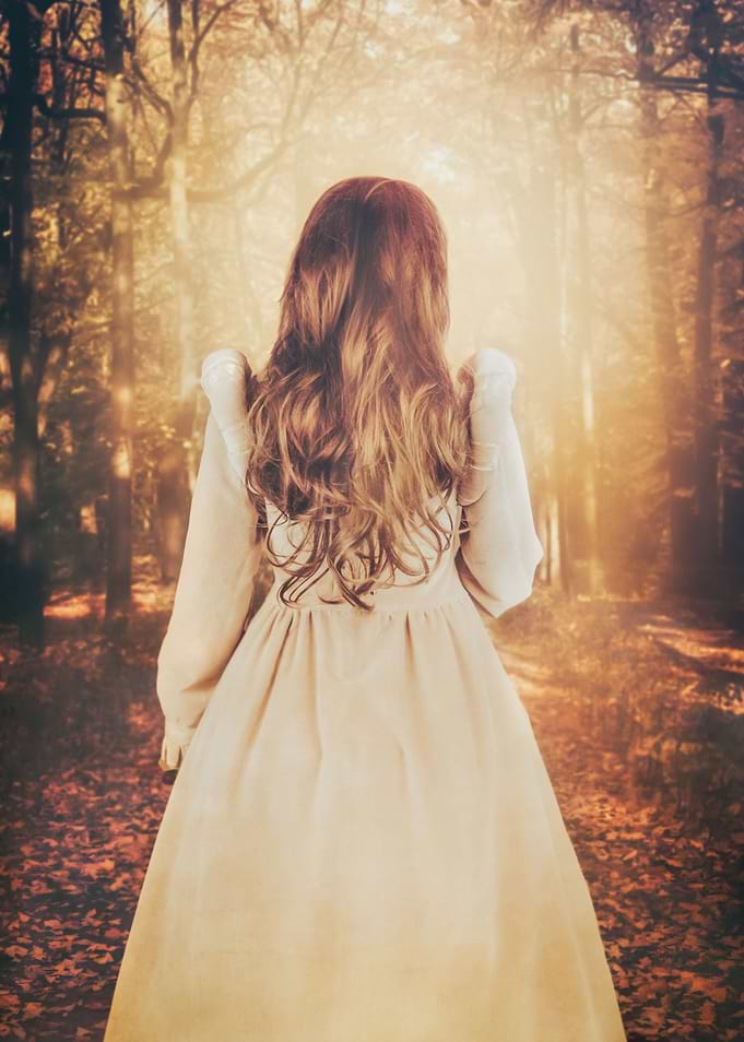 Girl wearing light dress in the park