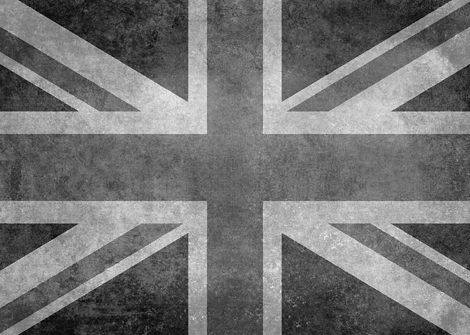 British Union Jack flag with worn vintage patina in Bla ...