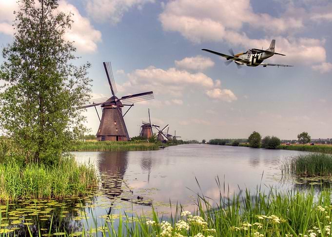 P51 Mustang over the dutch mills