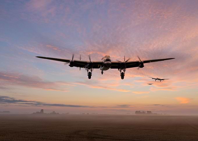 RAF Lancaster Bombers come home