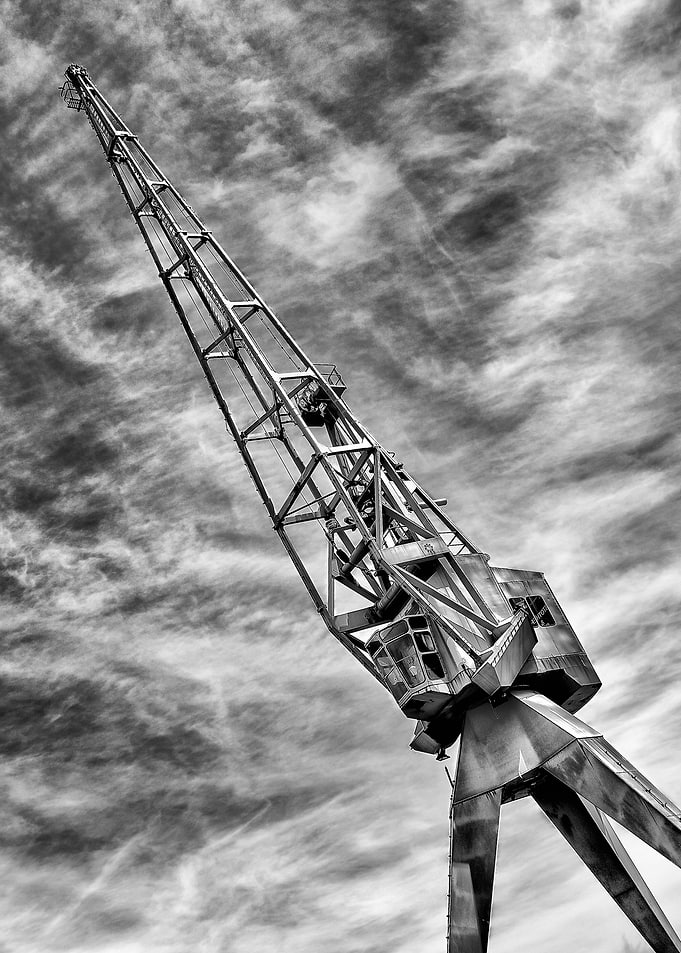 Old dock crane in monochrome
