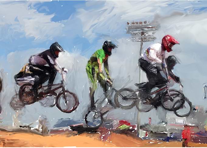 BMX racers fly through the air