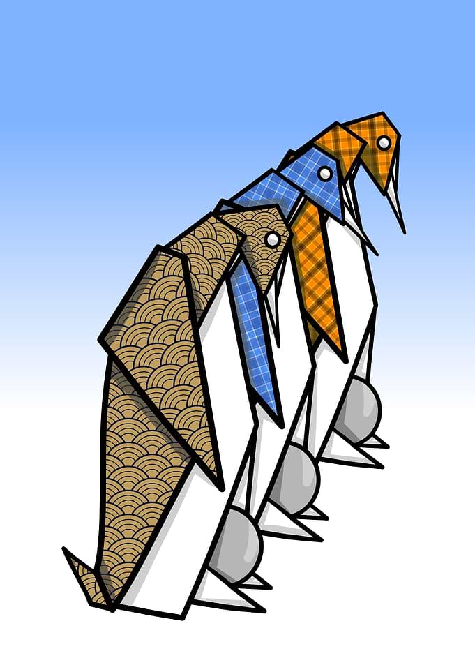 Three origami emperor penguins protecting their eggs.