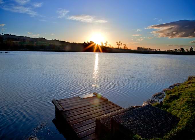 A shot from a Scottish fishing lake during a beautiful ...