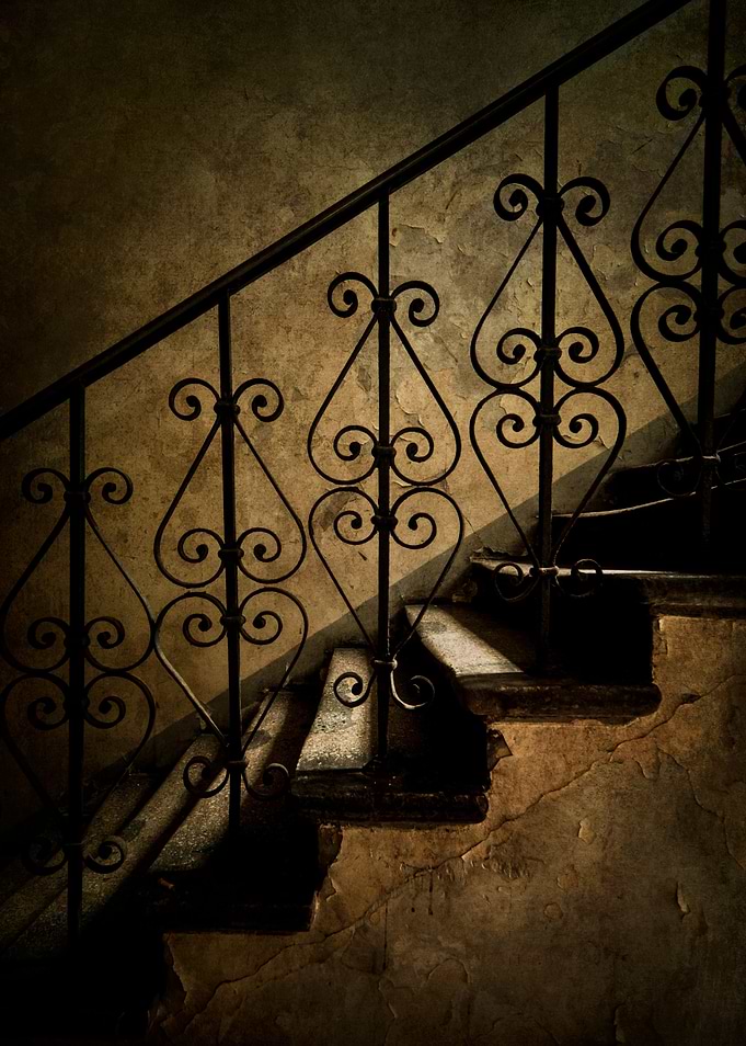 Ornamented handrail in the old staircase