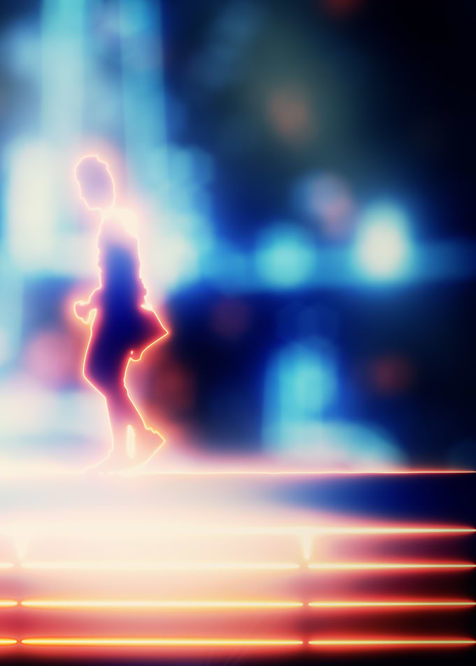 Neon figures in front of a lighthouse (3 of 3)