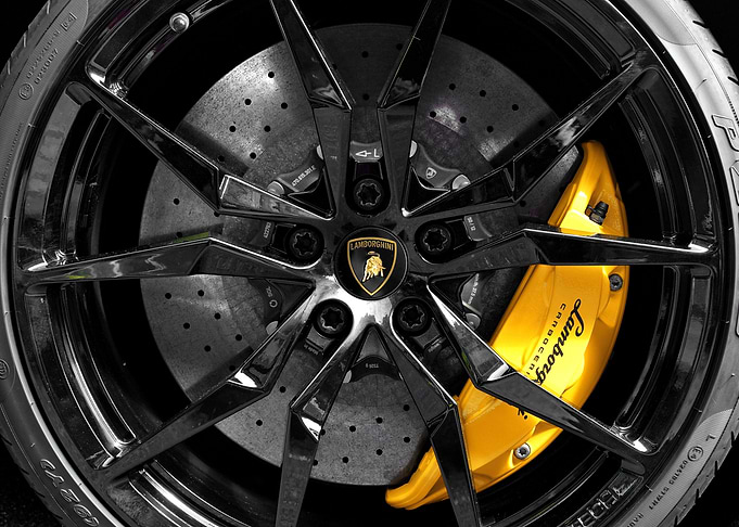 Close up of a disc brake and caliper of a modern Lambor ...