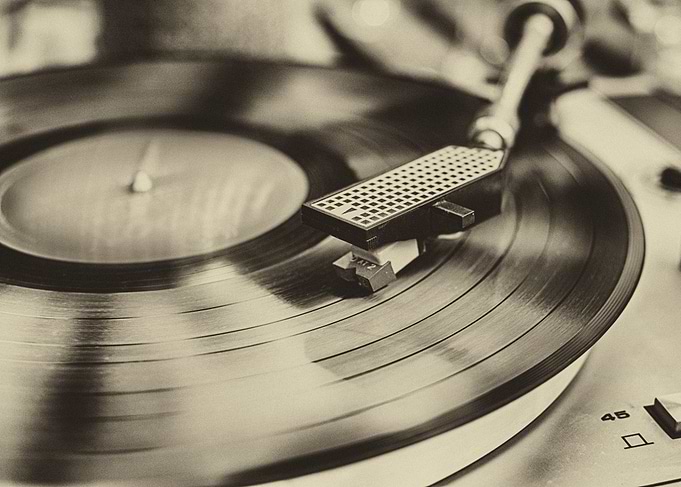 Vinyl record player in sepia.