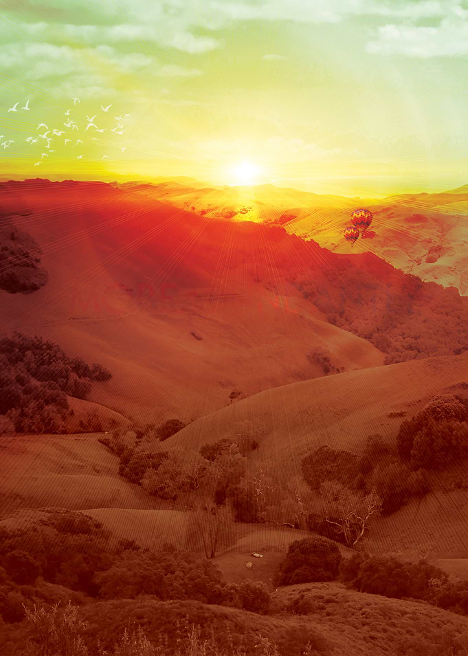 Rising Sun - a colorful sun rising over the horizon abo ...