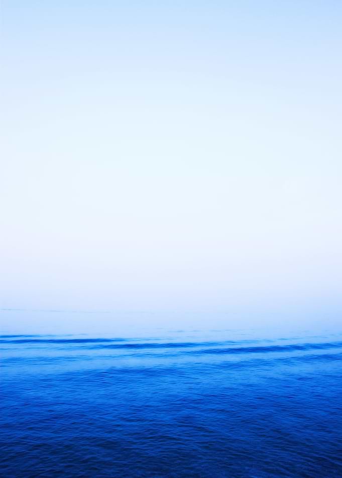 an abstract and simple view of sky and water, it gives ...