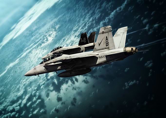 Two Us Navy FA-18 Super Hornets over the Ocean