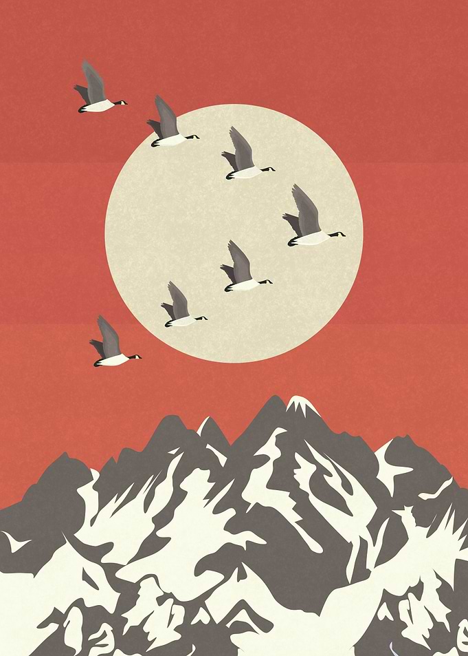 Migratory birds flying over the mountains.