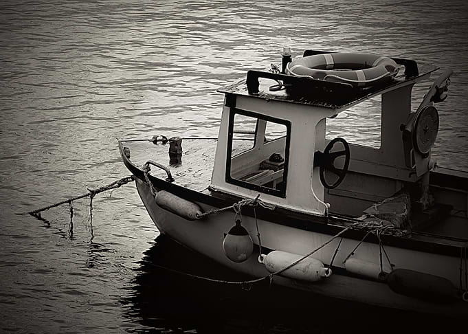 Small fishing boat moored up for the night in the Scott ...