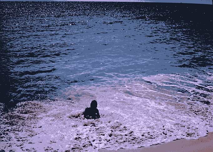 Abstract of a woman enjoying the waves in the ocean whi ...