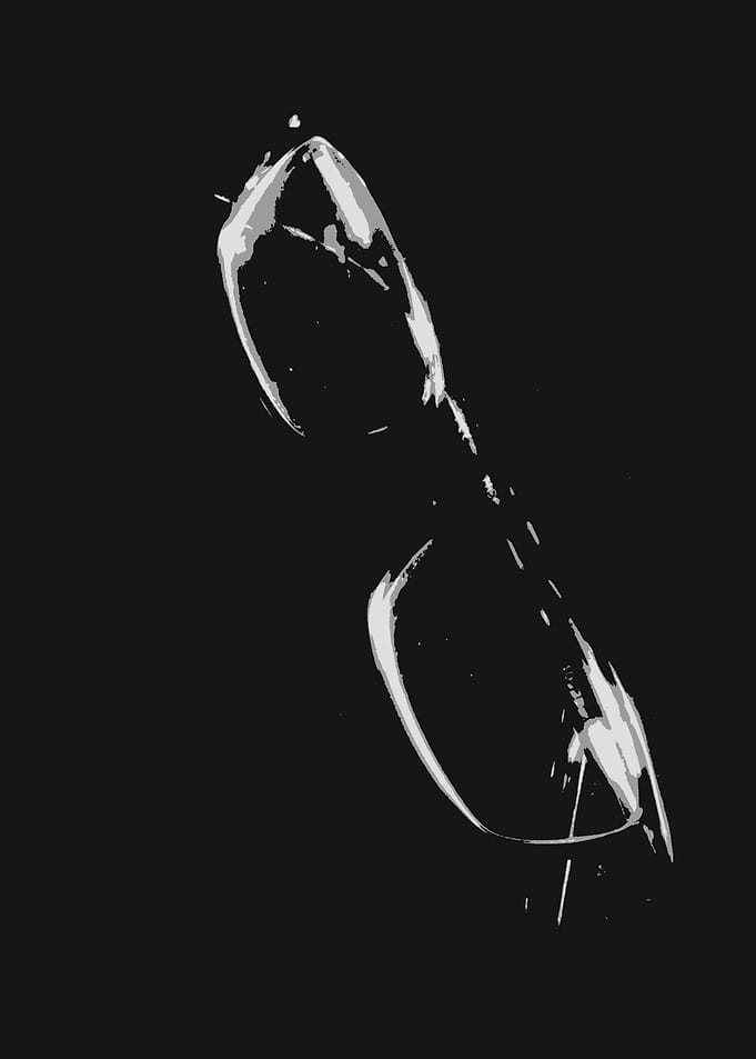 Abstract black and white image of a pair of glasses gre ...