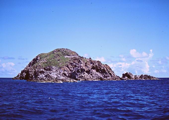 Lonely mountain cliffs in the ocean.